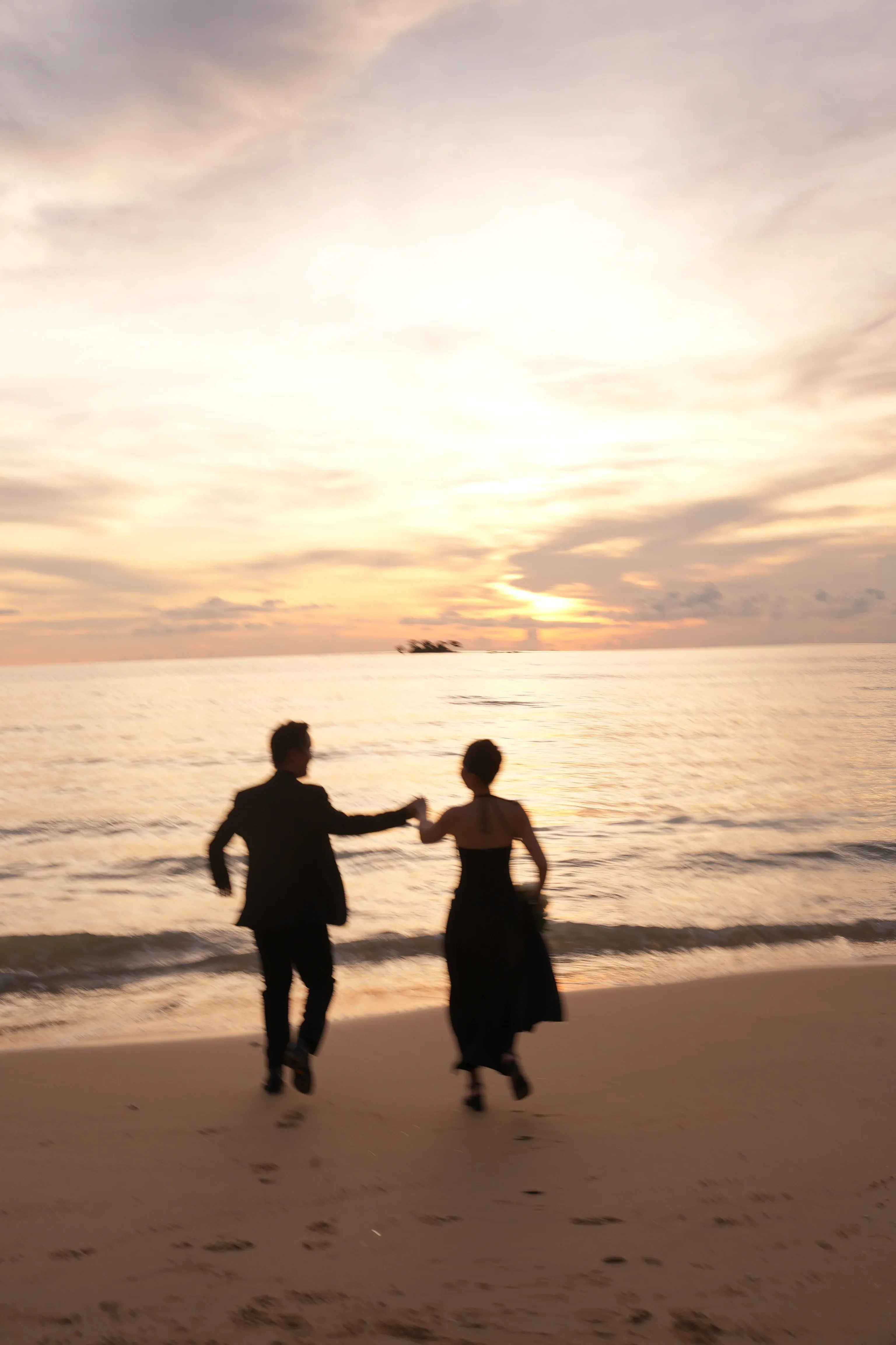 Couple walking up stone staircase